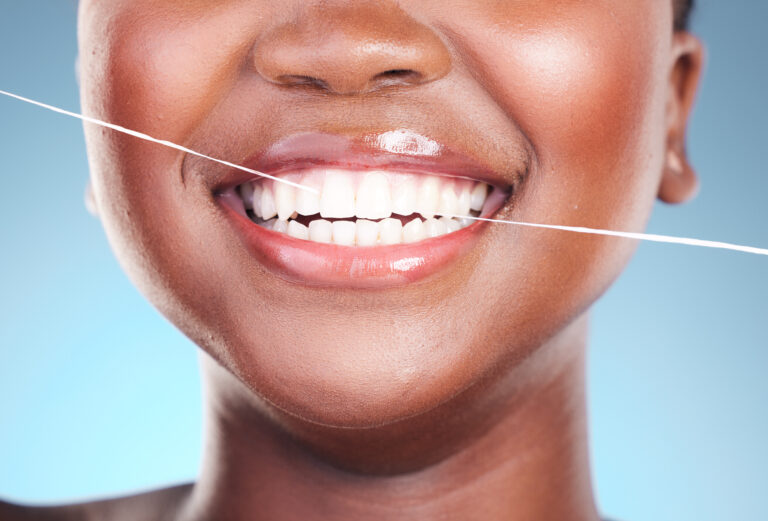 happy woman dental floss